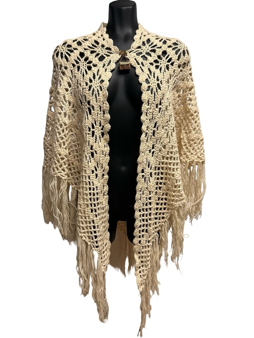 beige, boho-style handmade crochet wedding shawl featuring openwork and fringe